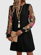 Ellis | Women's Dress with Plunging Neckline and Sheer Sleeves